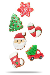 Tasty Christmas cookies of different shapes in air on white background