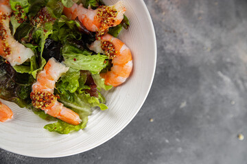 salad shrimp or prawns langoustines green leaf lettuce mix fresh meal food snack on the table copy space food background rustic top view