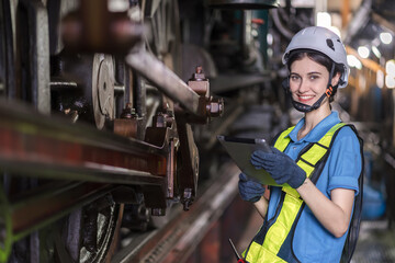 Engineer checking construction process railway and checking work on railroad station . Railway...