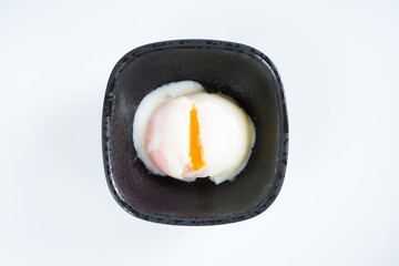 Onsen tamago  (Unlike with soft boiled egg, its yolk is hard while its white is soft)