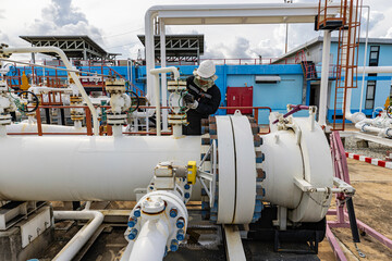 Male worker inspection and measurement thickness pipeline oil and gas at check record pipeline