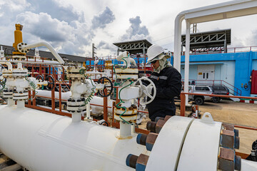 Male worker inspection and measurement thickness pipeline oil and gas at check record pipeline