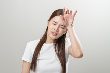 Sweaty young woman feeling discomfort and hot isolated on background