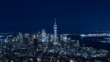 The New York city night view with the lights on in the skyscrapers at night