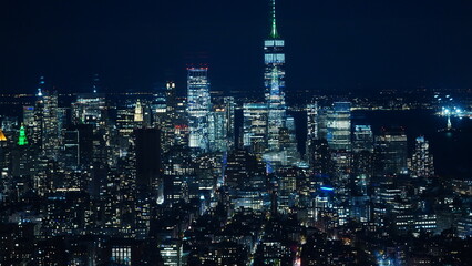 Fototapeta premium The New York city night view with the lights on in the skyscrapers at night
