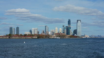 Fototapeta premium The New York manhattan view from the ferry boat in the sunny day