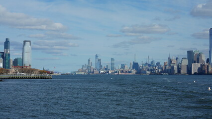 Fototapeta premium The New York manhattan view from the ferry boat in the sunny day