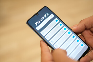Job Search via smartphone. Online job interview and job search. Close up