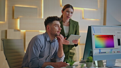 Professional designers developing project in creative agency. Woman checking 