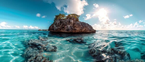  A rock emerges from the center of a water body, small island included in the background of an ocean expanse