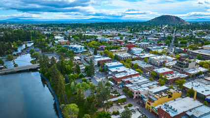 Aerial View of Bend Oregon Townscape with River and Hill