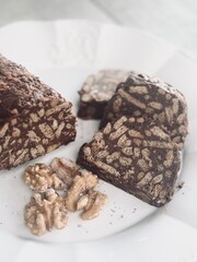 Plate with chocolate salami dessert.
