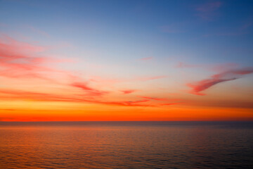 From blue to red sky over the Baltic Sea, Ustronie Morskie, West Pomerania, Poland © marek_usz