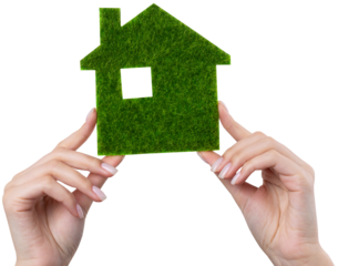 Female hands hold a model of a green house close-up. Sale of ecological real estate of the future.