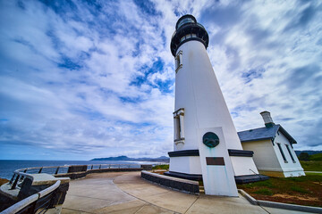 Majestic Yaquina Head Lighthouse with Keeper's House Low Angle View