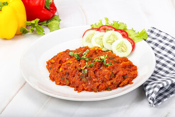 Shaakshuka eggs with tomato and herbs