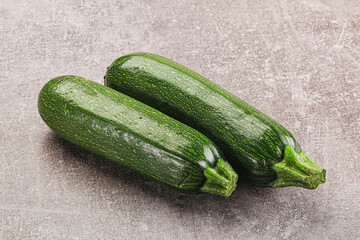 Raw green ripe zucchini vegetable
