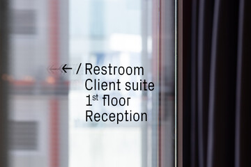 Modern Office Vinyl Signage on Reflective Glass