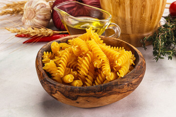 Italian dry pasta Fussili for bowl