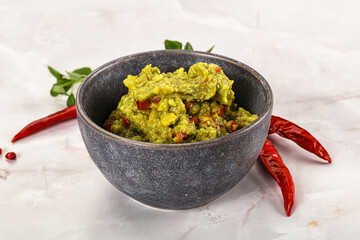 Guacamole with avocado, tomato and chili