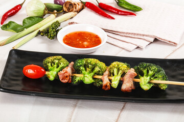 Thai Street foof satay with bacon and broccoli
