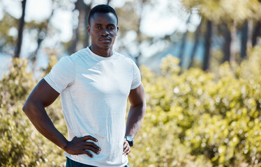 Fototapeta premium Black man, portrait and confident for fitness in outdoor for morning workout routine, exercise and proud for healthy living. Male person, nature and determination for physical cardio and training.