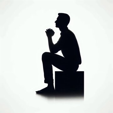recommend clip art: Silhouette of praying person isolated on white background