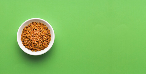 Natural aromatic fenugreek seeds in bowl - Natural food
