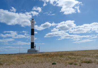 Lighthouse in Dungeness on the Kent coast. Captured on a bright and sunny day