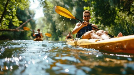 Fit man kayaking down a serene river, enjoying the sunny weather and verdant surroundings, as others paddle in the background, emphasizing outdoor adventure.