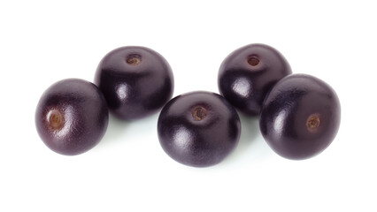 Fresh ripe acai berries isolated on white