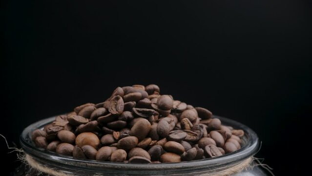 coffee beans on a dark background macro video