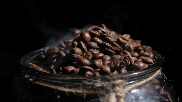 coffee beans on a dark background macro video