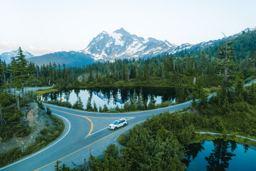 View of a car driving through Artist point area, scenic view in Mt. Baker Snoqualmie National Forest Park, Washington, USA. © Victoria Nefedova