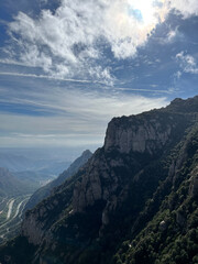 Naklejka premium clouds over the mountains