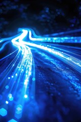 Blue lit road with blue line in middle