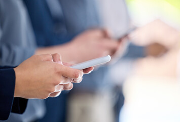 Hands, business person and phone closeup for job search, we are hiring website and cv update in office. Adult, typing and mobile notification for email marketing, vacancy link and recruitment app