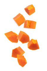 Falling papaya sliced isolated on white background