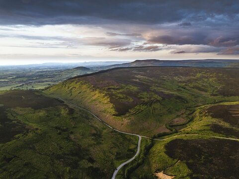 Sunset over Cod Beck Reservoir from a drone, North York Moors National Park, North Yorkshire, England, United Kingdom, Europe