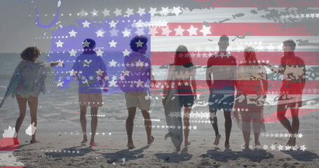 Image of flag of usa over happy diverse friends on beach in summer