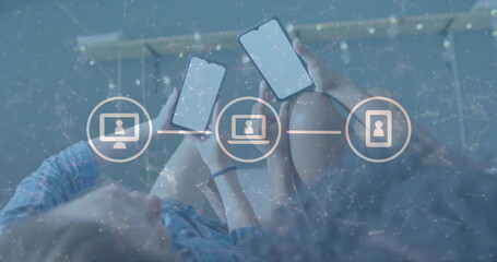 Image of icons and data processing over diverse women using smartphones