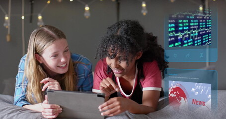 Image of data processing over diverse women using tablet
