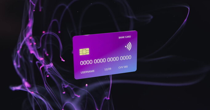 Image of credit card over light trails on black background