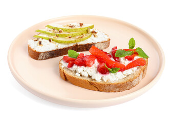 Delicious bruschettas with fresh ricotta (cream cheese), strawberry, mint and pear isolated on white