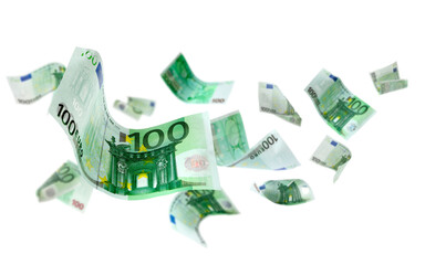 Many euro banknotes in air on white background