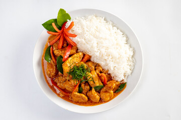  Panang curry over rice isolated on white background.