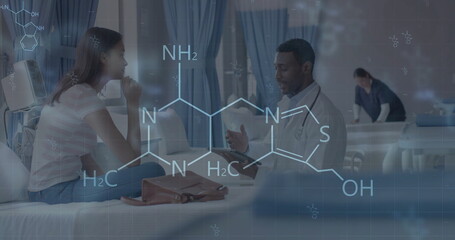 Image of scientific data over diverse male doctor and patient in hospital