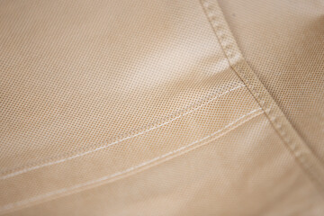 Close-up of beige fabric texture background