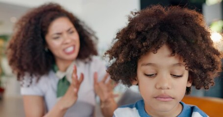 Mother, shouting and angry with kid in home, discipline issue and family crisis with boy ignoring parent. Conflict, together and distressed woman in living room, childhood development and problem
