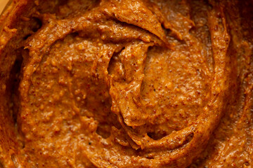 Baby food, vegetable puree close-up. Apple-carrot puree chopped in a blender. Background texture of food for newborn children.